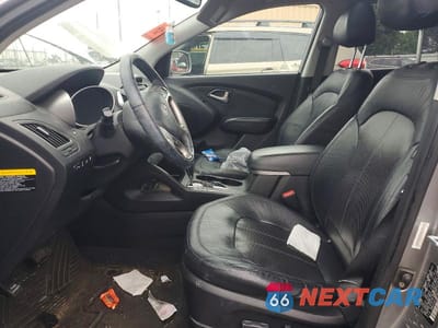 Zdjęcie 7 z 13 samochodu: 2013 HYUNDAI TUCSON LIMITED VIN:KM8JUCAC3DU558132 - miniatura