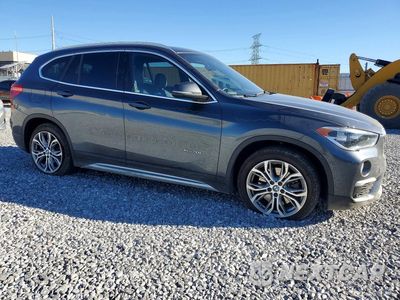 Czwarte zdjęcie samochodu z boku: 2016 BMW X1 XDRIVE28I VIN:WBXHT3C32GP883511 - miniatura