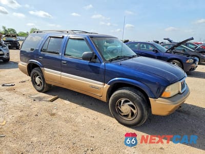 Czwarte zdjęcie samochodu z boku: 1999 GMC JIMMY VIN:1GKDT13W7X2524991 - miniatura