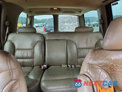 Zdjęcie 10 z 13 samochodu: 1999 CHEVROLET TAHOE C1500 VIN:1GNEC13R5XR150115 - miniatura