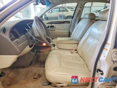 Zdjęcie 7 z 12 samochodu: 1999 LINCOLN TOWN CAR CARTIER VIN:1LNHM83W4XY622002 - miniatura