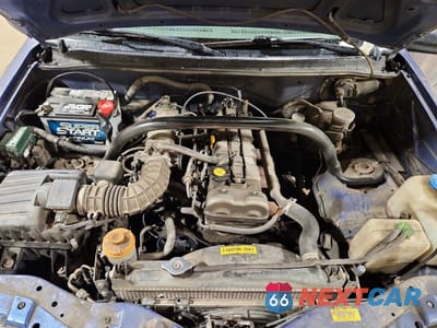 Zdjęcie 12 z 13 samochodu: 1999 CHEVROLET TRACKER VIN:2CNBJ13C0X6932410 - miniatura