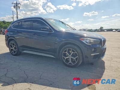Czwarte zdjęcie samochodu z boku: 2018 BMW X1 SDRIVE28I VIN:WBXHU7C32J5H41735 - miniatura