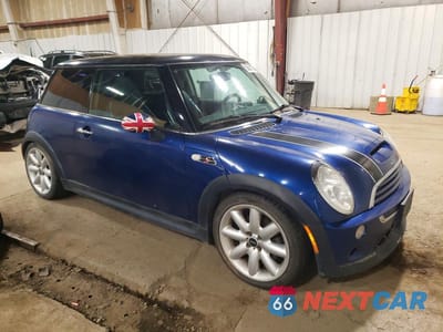 Czwarte zdjęcie samochodu z boku: 2003 MINI COOPER S VIN:WMWRE33443TD59783 - miniatura
