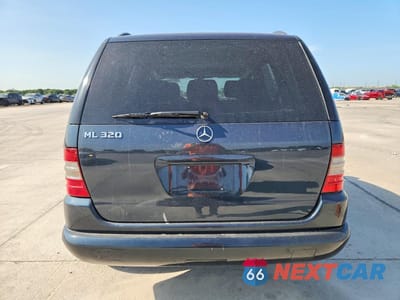 Zdjęcie 6 z 13 samochodu: 2000 MERCEDES-BENZ ML 320 VIN:4JGAB54E9YA174586 - miniatura