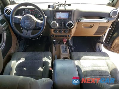 Zdjęcie 8 z 12 samochodu: 2012 JEEP WRANGLER UNLIMITED RUBICON VIN:1C4BJWFGXCL178580 - miniatura