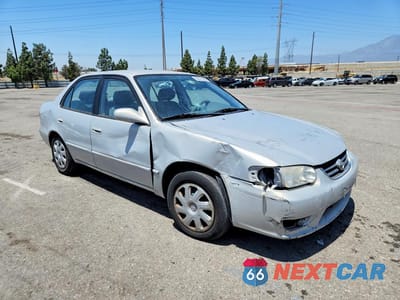 Czwarte zdjęcie samochodu z boku: 2001 TOYOTA COROLLA LE VIN:1NXBR12E01Z461539 - miniatura