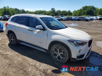 Czwarte zdjęcie samochodu z boku: 2017 BMW X1 XDRIVE28I VIN:WBXHT3C31H5F71132 - miniatura