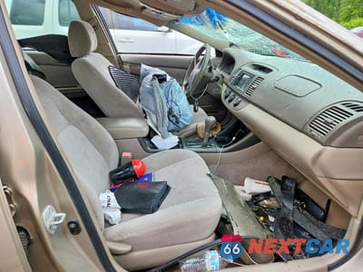 Zdjęcie 7 z 11 samochodu: 2004 TOYOTA CAMRY LE VIN:4T1BE32K14U307598 - miniatura