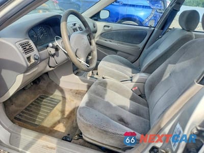 Zdjęcie 7 z 12 samochodu: 2000 TOYOTA COROLLA VE VIN:2T1BR12E1YC343334 - miniatura