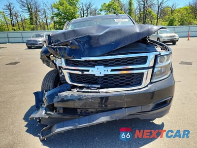 Piąte zdjęcie samochodu w środku: 2017 CHEVROLET SUBURBAN K1500 LT VIN:1GNSKHKC9HR343820 - miniatura
