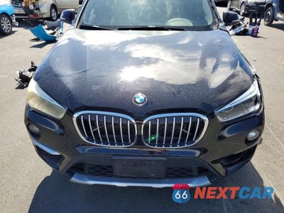 Zdjęcie 12 z 13 samochodu: 2018 BMW X1 XDRIVE28I VIN:WBXHT3C36J5K20462 - miniatura