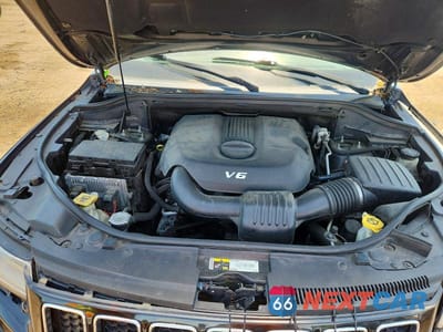 Zdjęcie 12 z 13 samochodu: 2014 JEEP GRAND CHEROKEE OVERLAND VIN:1C4RJECGXEC410191 - miniatura