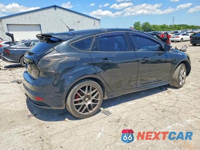 Trzecie zdjęcie samochodu z tyłu: 2014 FORD FOCUS ST VIN:1FADP3L98EL292551 - miniatura