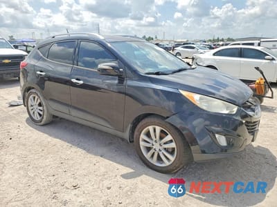 Czwarte zdjęcie samochodu z boku: 2013 HYUNDAI TUCSON LIMITED VIN:KM8JU3AC1DU585510 - miniatura