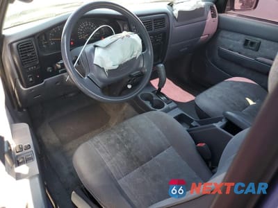 Zdjęcie 8 z 12 samochodu: 2000 TOYOTA TACOMA XTRACAB PRERUNNER VIN:5TESN92N7YZ709818 - miniatura