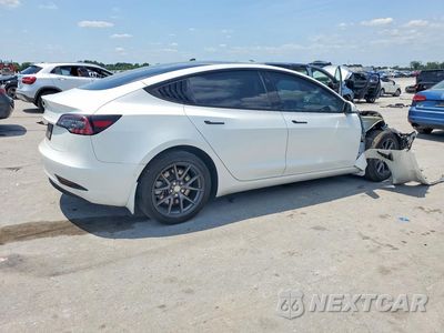 Trzecie zdjęcie samochodu z tyłu: 2021 TESLA MODEL 3 VIN:5YJ3E1EA4MF090010 - miniatura