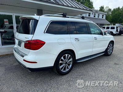 Czwarte zdjęcie samochodu z boku: 2013 MERCEDES-BENZ GL 450 4MATIC VIN:4JGDF7CE0DA157944 - miniatura