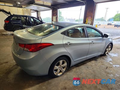 Trzecie zdjęcie samochodu z tyłu: 2012 HYUNDAI ELANTRA VIN:KMHDH4AE4CU306347 - miniatura