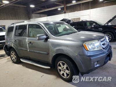 Czwarte zdjęcie samochodu z boku: 2009 HONDA PILOT TOURING VIN:5FNYF48889B011619 - miniatura