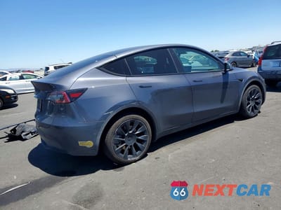 Trzecie zdjęcie samochodu z tyłu: 2022 TESLA MODEL Y VIN:7SAYGDEE9NF328488 - miniatura