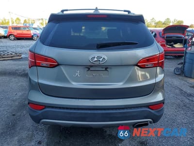 Zdjęcie 6 z 14 samochodu: 2013 HYUNDAI SANTA FE SPORT 2.4L VIN:5XYZU3LB5DG118913 - miniatura