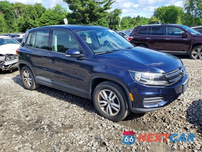 Czwarte zdjęcie samochodu z boku: 2013 VOLKSWAGEN TIGUAN VIN:WVGBV3AX2DW072226 - miniatura