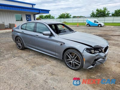 Czwarte zdjęcie samochodu z boku: 2023 BMW M5 VIN:WBS83CH0XPCM97267 - miniatura
