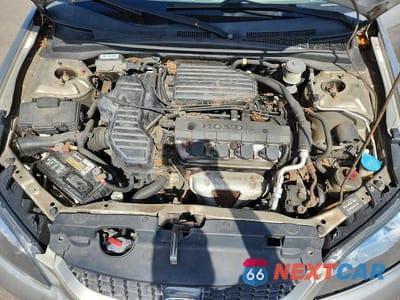 Zdjęcie 11 z 12 samochodu: 2004 HONDA CIVIC LX VIN:1HGEM22564L033668 - miniatura