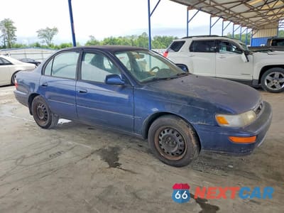 Czwarte zdjęcie samochodu z boku: 1997 TOYOTA COROLLA DX VIN:2T1BB02E6VC185258 - miniatura
