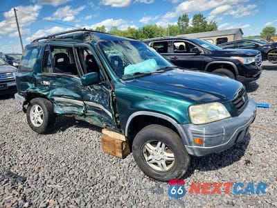 Czwarte zdjęcie samochodu z boku: 1999 HONDA CR-V EX VIN:JHLRD186XXC036896 - miniatura