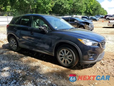 Czwarte zdjęcie samochodu z boku: 2016 MAZDA CX-5 TOURING VIN:JM3KE2CY9G0780282 - miniatura