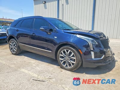 Czwarte zdjęcie samochodu z boku: 2021 CADILLAC XT5 SPORT VIN:1GYKNGRS2MZ189964 - miniatura
