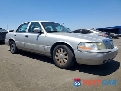 Czwarte zdjęcie samochodu z boku: 2005 MERCURY GRAND MARQUIS LS VIN:2MEHM75W45X632133 - miniatura