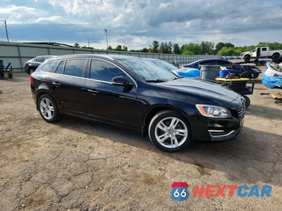 Czwarte zdjęcie samochodu z boku: 2015 VOLVO V60 PREMIER VIN:YV140MEKXF1267873 - miniatura