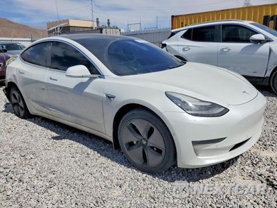 Czwarte zdjęcie samochodu z boku: 2020 TESLA MODEL 3 VIN:5YJ3E1EA4LF631524 - miniatura