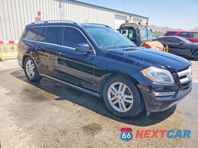 Czwarte zdjęcie samochodu z boku: 2015 MERCEDES-BENZ GL 450 4MATIC VIN:4JGDF6EE0FA459485 - miniatura