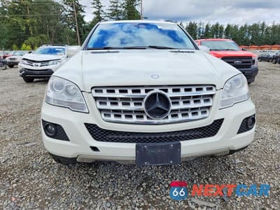 Piąte zdjęcie samochodu w środku: 2010 MERCEDES-BENZ ML 350 BLUETEC VIN:4JGBB2FB2AA576400 - miniatura