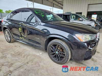 Czwarte zdjęcie samochodu z boku: 2015 BMW X4 XDRIVE28I VIN:5UXXW3C58F0M87509 - miniatura