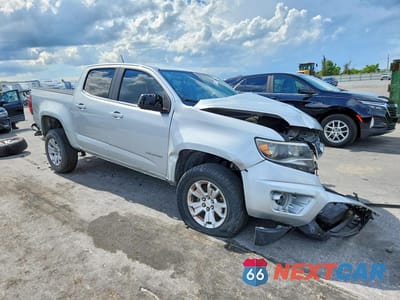 Czwarte zdjęcie samochodu z boku: 2018 CHEVROLET COLORADO LT VIN:1GCGSCENXJ1175298 - miniatura