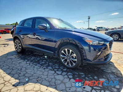 Czwarte zdjęcie samochodu z boku: 2019 MAZDA CX-3 TOURING VIN:JM1DKFC72K0435810 - miniatura