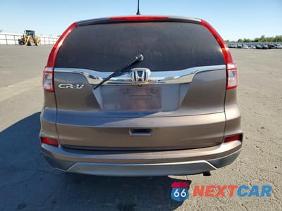 Zdjęcie 6 z 14 samochodu: 2015 HONDA CR-V LX VIN:3CZRM3H3XFG702739 - miniatura