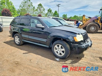 Czwarte zdjęcie samochodu z boku: 2009 JEEP GRAND CHEROKEE LAREDO VIN:1J8GR48K39C530534 - miniatura