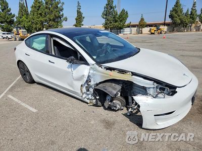 Czwarte zdjęcie samochodu z boku: 2023 TESLA MODEL 3 VIN:5YJ3E1EA4PF599020 - miniatura