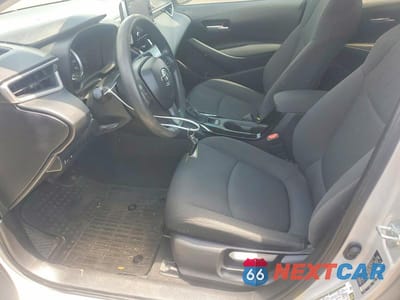 Zdjęcie 7 z 12 samochodu: 2021 TOYOTA COROLLA LE VIN:5YFEPMAE1MP178689 - miniatura