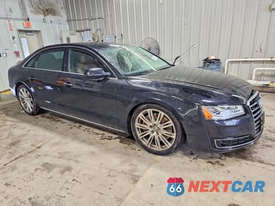 Czwarte zdjęcie samochodu z boku: 2015 AUDI A8 L QUATTRO VIN:WAU3GAFD0FN012358 - miniatura