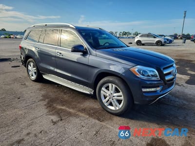 Czwarte zdjęcie samochodu z boku: 2016 MERCEDES-BENZ GL 450 4MATIC VIN:4JGDF6EE8GA701201 - miniatura