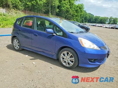Czwarte zdjęcie samochodu z boku: 2011 HONDA FIT SPORT VIN:JHMGE8G56BC021094 - miniatura