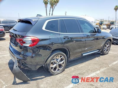 Trzecie zdjęcie samochodu z tyłu: 2021 BMW X3 XDRIVE30E VIN:5UXTS1C05M9G31824 - miniatura