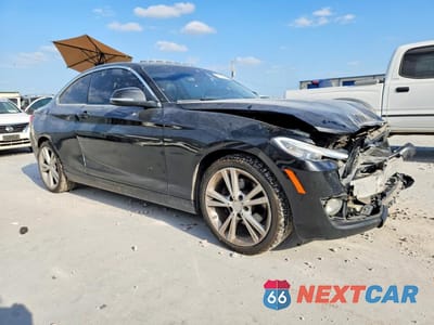 Czwarte zdjęcie samochodu z boku: 2015 BMW 228 I VIN:WBA1F5C58FV257391 - miniatura